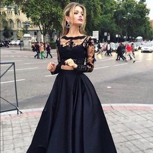 Black, two piece, long sleeved prom dress